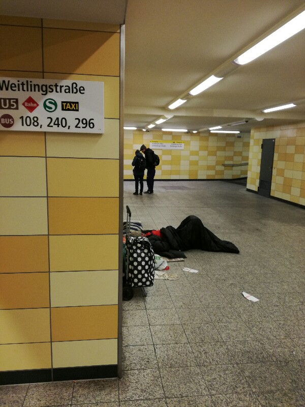 Homeless person sleeping in U-Bahn station Berlin (Lichtenberg) - Photo: Stefan Klenke