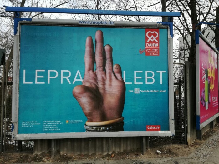 Street photo of poster for the Lepra Lebt campaign - Berlin Treptow (Photo by Stefan Klenke)