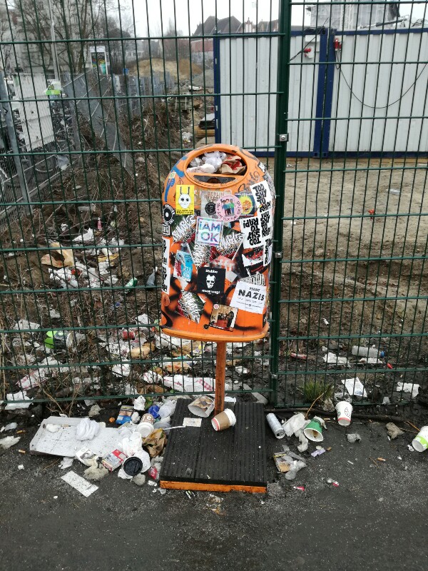 Streetphoto of a messy stickercovered bin near Berlin Ostkreuz, by Stefan Klenke