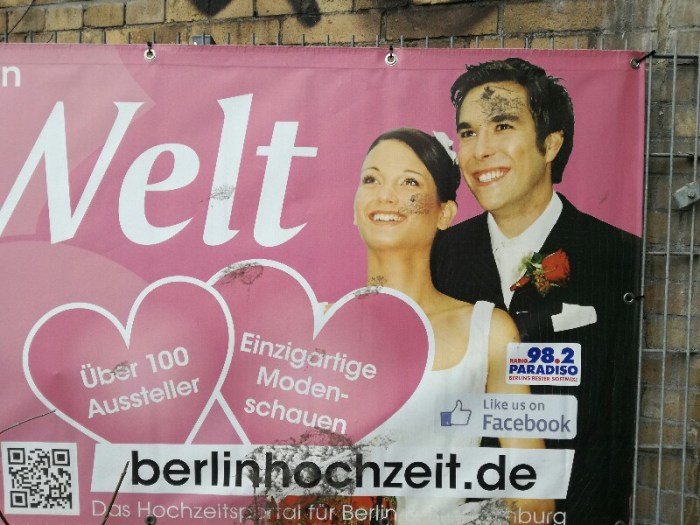 street photo by stefan klenke of a dirty wedding show poster